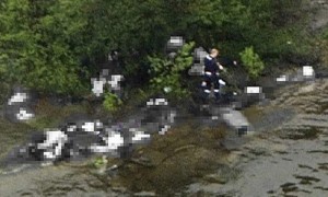 Foto aérea del momento del tiroteo en la isla de Utøya. La Policía cree que el hombre que aparece en la imagen es el autor confeso de la matanza