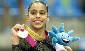 La guatemalteca Ana Sofía Gómez tras lograr el oro de la viga de equilibro de la gimnasia artística de los Juegos Panamericanos 2011. Foto: Jesús Espinosa / Efe