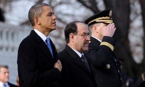 El presidente de los EE UU, Barack Obama, y el primer ministro iraquí, Nouri Al Maliki, asisten a un acto en memoria de los caídos, en el cementerio nacional de Arlington, en el estado de Virginia, EE UU. Foto: Olivier Douliery / Efe