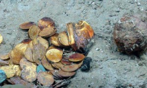 Agunas de las monedas de plata y oro recuperadas por Odyssey. Foto: Efe